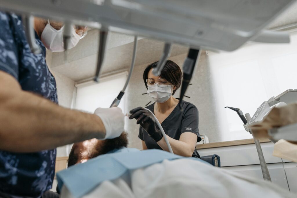 dentists working on a patient